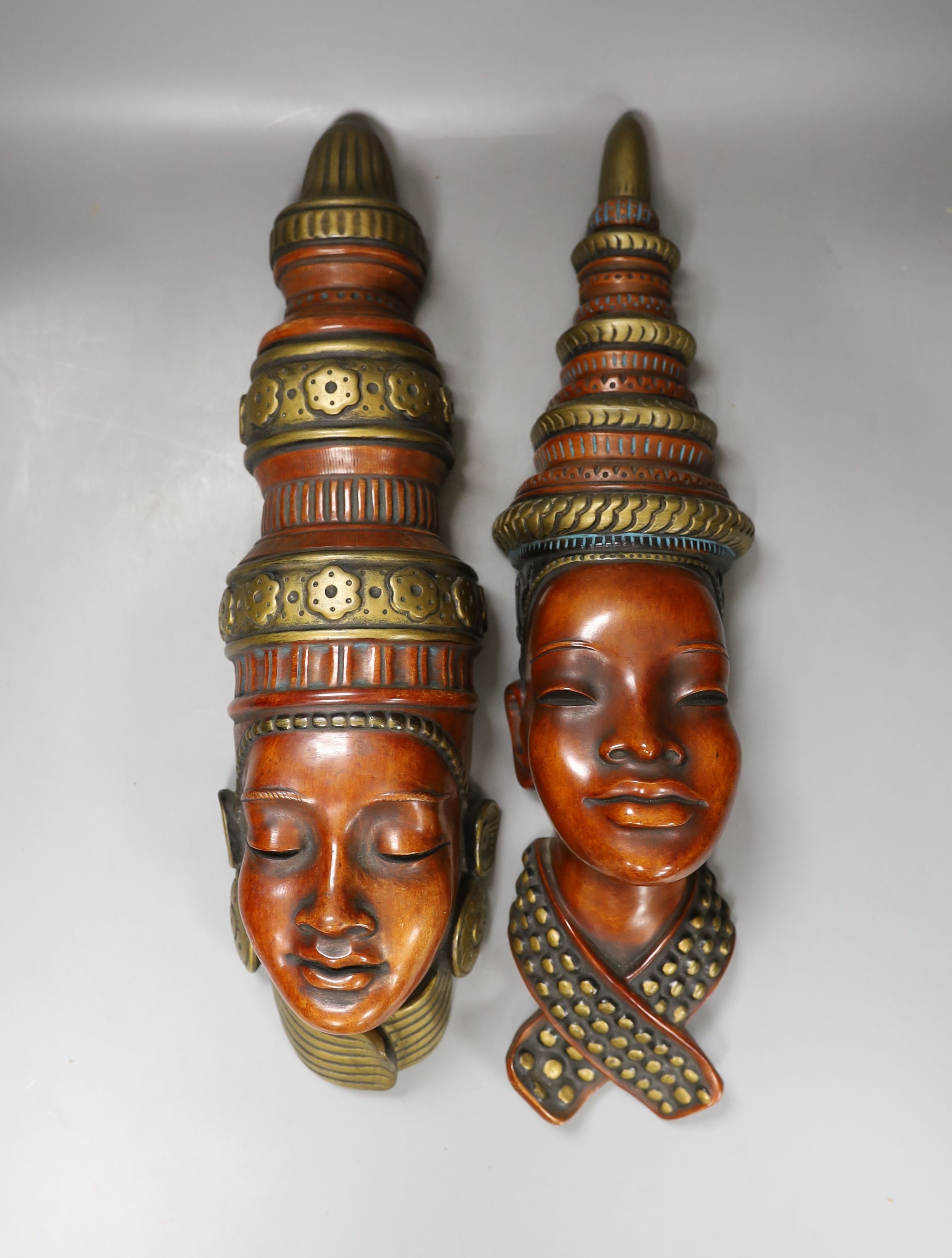 Two German Achatit wall masks - 46cm tall